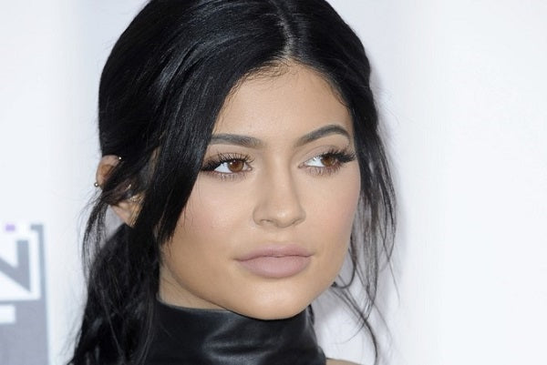 Kylie Jenner Channels Sultry Easter Bunny In Skintight Dress & Gold Bunny Ears