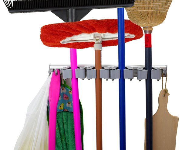 Shop here not yet another mop and broom holder 2 hangers pack 3 sliding grippers 4 hooks each extra space in between clips hold everything better than rollers wall mount on aluminum rack by 2 screws only